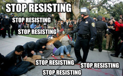 police to protesters Stop Resisting